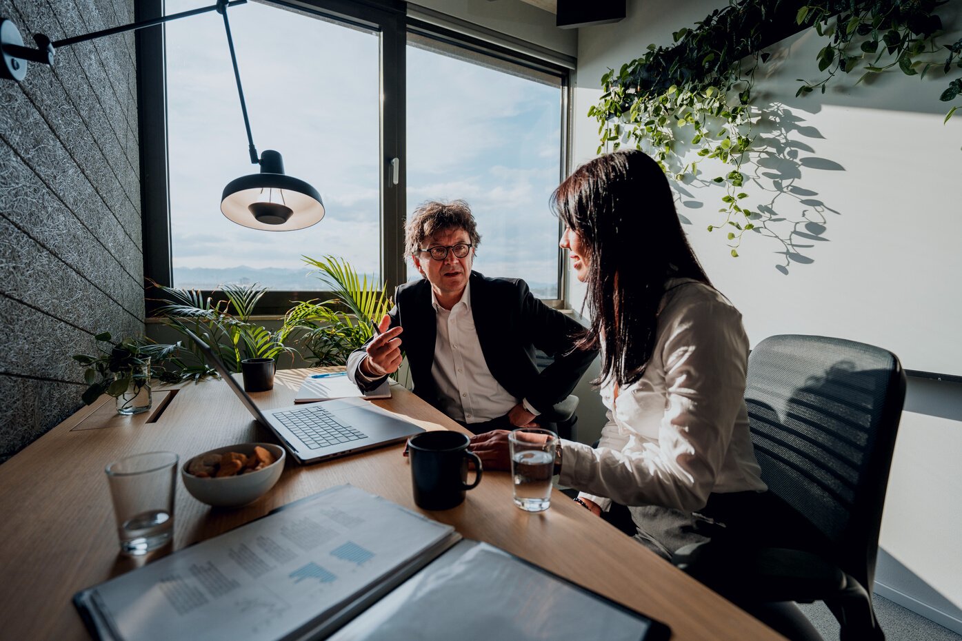 Well-Dressed Corporate Employees In A Business Meeting